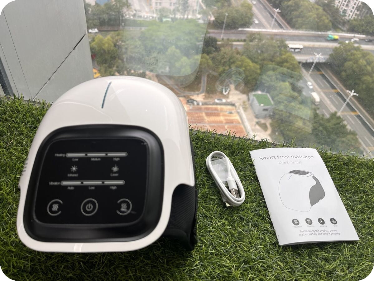 FlexoraKnee knee massager with USB charging cable and user manual